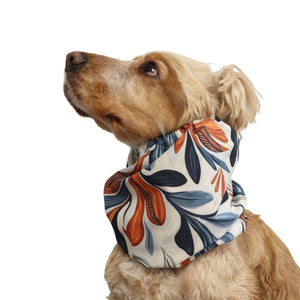Cocker Spaniel wearing the Autumn Bloom dog snood from another angle, showing the fit around the neck and the full botanical print.