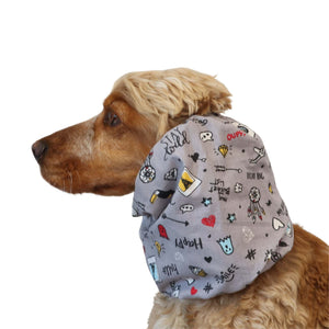 Cocker wearing cotton summer dog snood with colorful doodles, perfect for protecting long ears in warm weather
