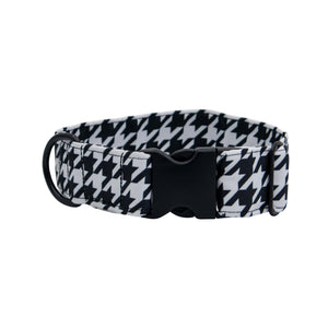 Black and white houndstooth patterned collar on a white background
