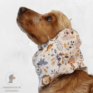 Cocker spaniel wearing beige muslin dog snood with woodland animals print – Forest Friends by Distinguish Me