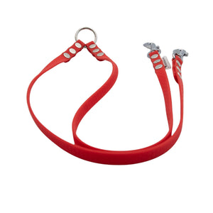 Red dog collar with silver hardware on a white background