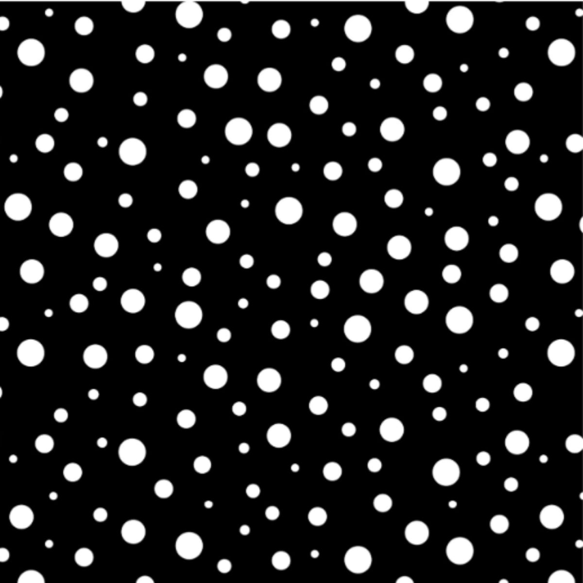 Close-up of the Black Dots pattern with white polka dots in different sizes on a black background.