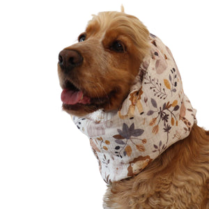 Spaniel wearing beige muslin dog snood with woodland animals print – Forest Friends by Distinguish Me