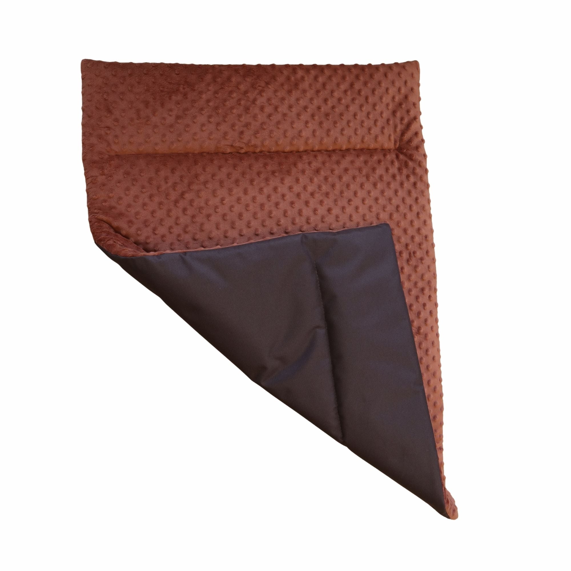 A brown minky dot blanket with a dark brown reverse side, shown folded on a plain white background.