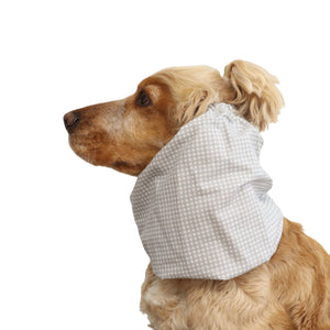 Side view of a Cocker Spaniel wearing the Pastel Cells cotton dog snood, showing how it keeps long ears covered during daily walks and feeding.