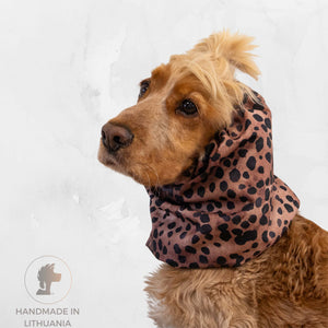 Dog wearing a leopard print scarf on a white background with 'Handmade in Lithuania' label.