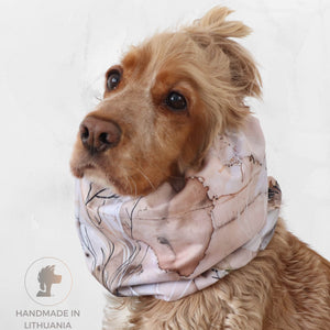 Cocker spaniel wearing Distinguish me Desert Flowers thick double waterproof dog snood in neutral floral print