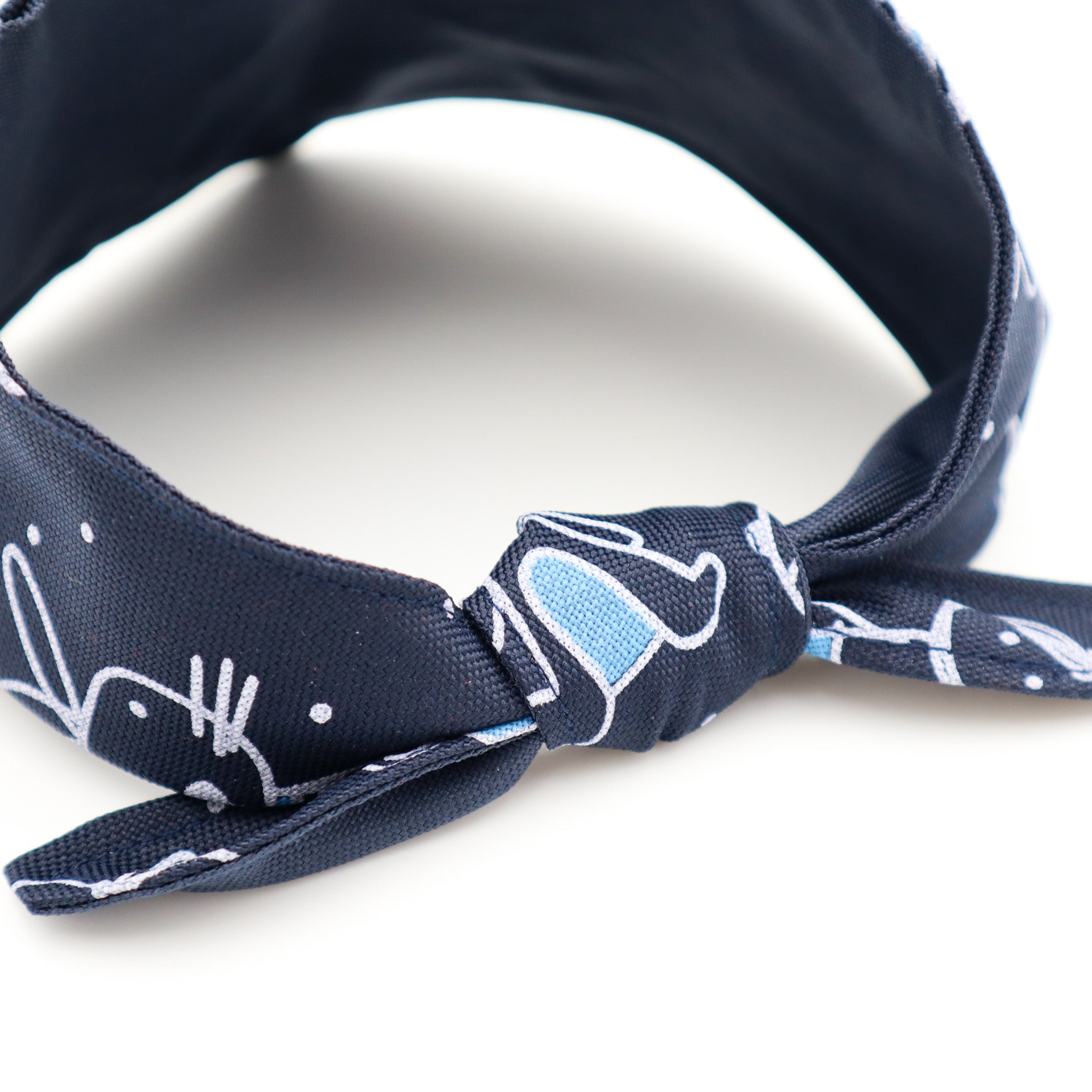 handmade, tie-on, navy blue dog bandana distinguish me
