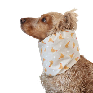 Long eared dog wearing a handmade cotton snood in Chicken or Egg print by Distinguish Me