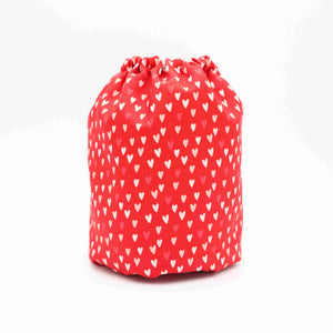 Red waterproof dog snood with white hearts shown on a white background – Distinguish Me