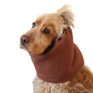 Lightweight feeding snood in cinnamon brown muslin worn by a Cocker Spaniel